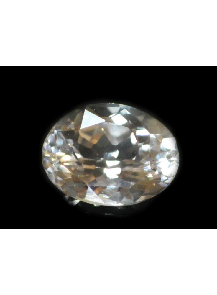 WHITE SAPPHIRE UNHEATED 0.88 CTS 18691 - TINT OF ORANGE HIGHLY LUSTROUS GEM