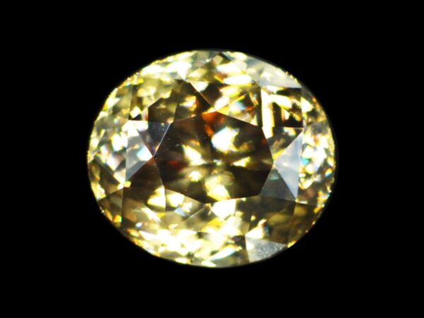 ZIRCON LUSTROUS GOLDEN YELLOW 4.27 CTS OVAL SHAPE NATURAL SRI LANKA LOOSE GEM