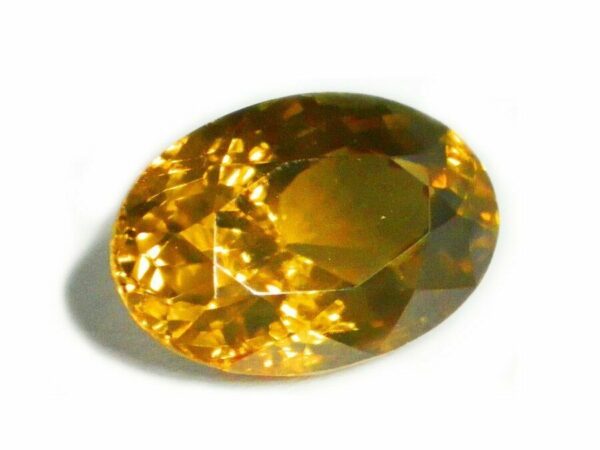 ZIRCON GOLDEN BROWN OVAL CUT 4.11 CTS - CEYLON NATURAL LOOSE GEM Clearance Sale - Image 2